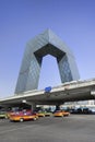 CCTV headquarters with taxis, Beijing, China